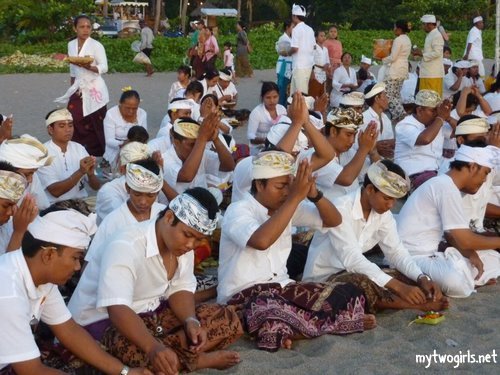 Praying in group at Petitenget beach
